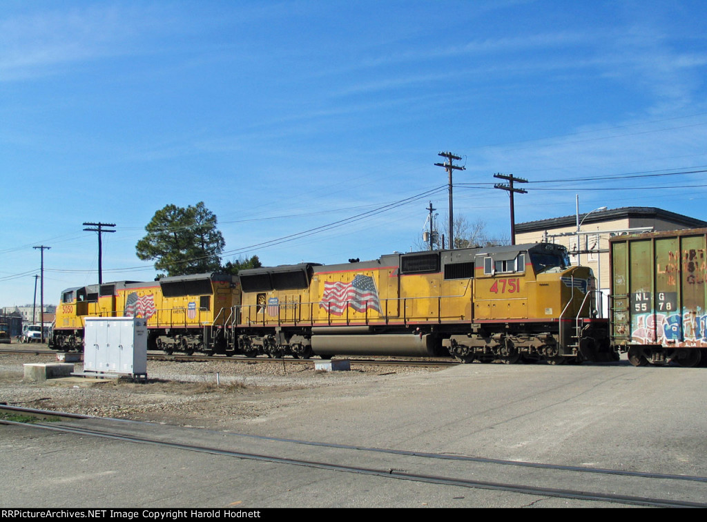 UP 5050 & 4751 lead a CSX train out of the yard
